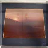 A10. Framed sunset photo. 14”h x 11”w - $18 